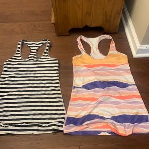 Never worn two lululemon tank top medium